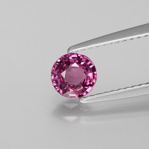 0.68 ct Red Rhodolite Garnet Gemstone, Rhodolite Garnet Gem in Round Facet Shape for Sale.