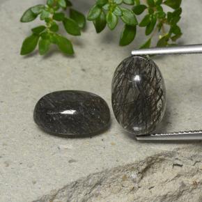 10.4ct Oval Cabochon Black Rutile Quartz for sale thumb image of 10.4ct Oval Cabochon Black Rutile Quartz (ID: 403508)
