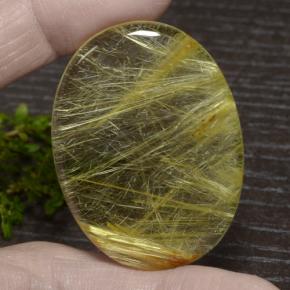 73.5ct Oval Cabochon Colorless Golden Rutile Quartz Gem for sale 73.5ct Oval Cabochon Colorless Golden Rutile Quartz Gem (ID: 472283)