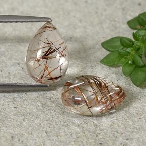 2.1ct Pear Cabochon Colorless with Red Rutile Quartz for sale thumb image of 2.1ct Pear Cabochon Colorless with Red Rutile Quartz (ID: 493638)