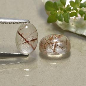 2ct Oval Cabochon Colorless with Red Rutile Quartz for sale thumb image of 2ct Oval Cabochon Colorless with Red Rutile Quartz (ID: 494476)