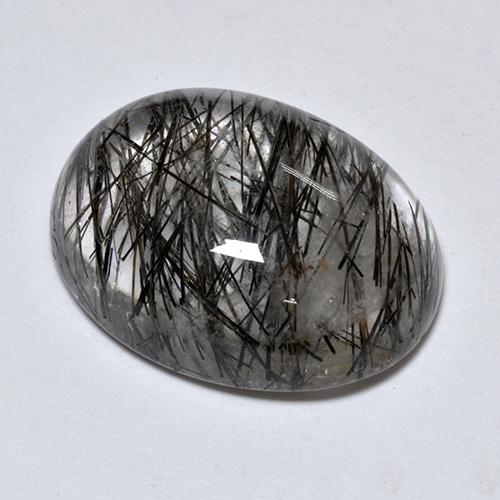 Claro con negro Cuarzo Rutilado Gema - 8.6ct Cabujón Óvalo (ID: 514204)