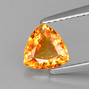 0.87 ct Orange Sapphire Gemstone, Sapphire Gem in Trillion Facet Shape for Sale.