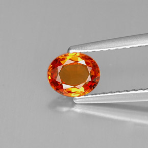0.69 ct Orange Sapphire Gemstone, Sapphire Gem in Oval Facet Shape for Sale.