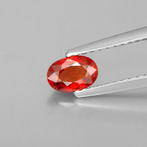 0.60 ct Orange Sapphire Gemstone, Sapphire Gem in Oval Facet Shape for Sale.