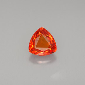 0.80 ct Orange Sapphire Gemstone, Sapphire Gem in Trillion Facet Shape for Sale.