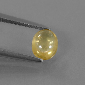 0.87 ct Yellow Sapphire Gemstone, Sapphire Gem in Oval Cabochon Shape for Sale.