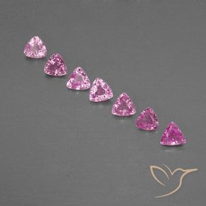 7pc 4.1 x 4mm Trillion Sapphire Lot - 1.65ct total Weight / avg. 0.24ct each, Color: Deep Pink, Mohs Hardness 9 suitable for daily wear jewelry, Symbolizes Abundance and Prosperity, Photo A