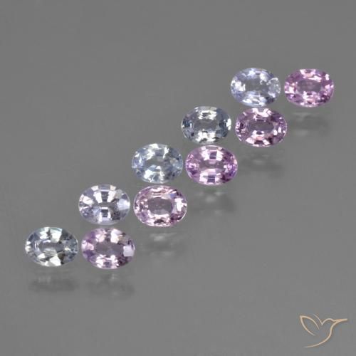 10-teiliges Set ovaler mehrfarbiger Saphir aus Tansania - Gewicht 2,34 ct gesamt / Durchschn. je 0,23ct, Größe 4,1 x 3,2mm, Farbe: Mehrfarbig, Mohs-Härte 9 Geeignet für den täglichen Gebrauch im Schmuck, Symbolisiert Überfluss und Wohlstand, Photo A