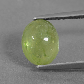 3.6ct Oval Cabochon Yellowish Green Sapphire Gem for sale 3.6ct Oval Cabochon Yellowish Green Sapphire Gem (ID: 427351)