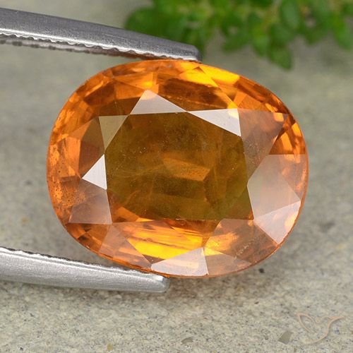 6.70ct Natural Medium-Dark Orange Sapphire, Oval, VS-SI