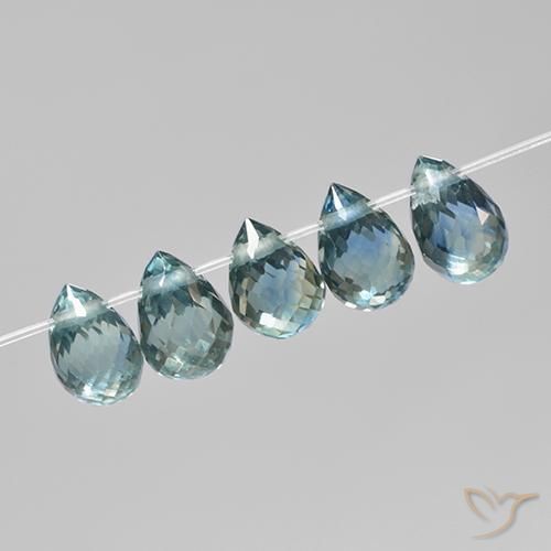 5pc Briolette With Hole Turquoise Sapphire Lot from Madagascar - Weight 2.33ct total / avg. 0.47ct each, Size 4.9x3.2 mm, Color: Teal Tone, Mohs Hardness 9 suitable for daily wear jewelry, Symbolizes Abundance and Prosperity, Photo A