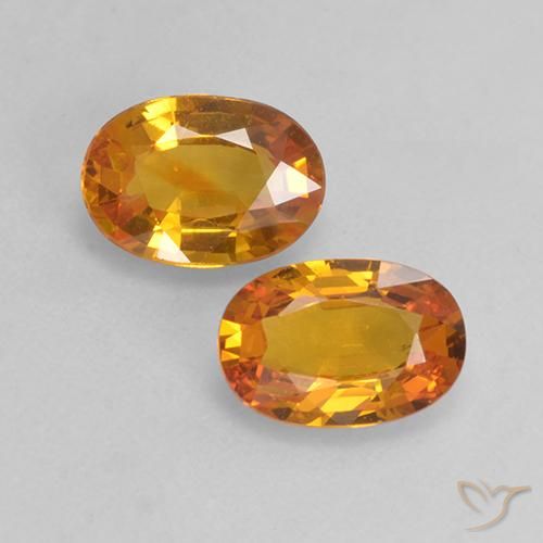 1.35 ct Loose Orange Sapphire, 6.4 x 4.6 mm Oval Cut From Madagascar, Photo A