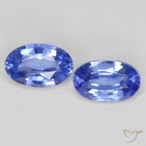 4,9 x 3,1mm Oval Saphir-Paar - Gewicht 0,55 ct gesamt / durchschnittl. 0,28 ct, Garantiert natürliche Edelsteine, Pastellblau Farbe in VS Reinheit, Mohs-Härte 9 Geeignet für den täglichen Gebrauch im Schmuck, Edelstein für Donnerstag, Photo A