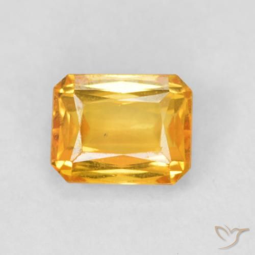 0.66ct Natural Dark Orange-Gold Sapphire, Emerald Cut, VS