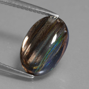 3.89 ct Multicolor Scapolite Gemstone, Scapolite Gem in Oval Cabochon Shape for Sale.