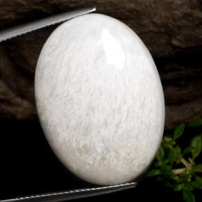 22ct Oval Cabochon White Scolecite for sale thumb image of 22ct Oval Cabochon White Scolecite (ID: 472807)