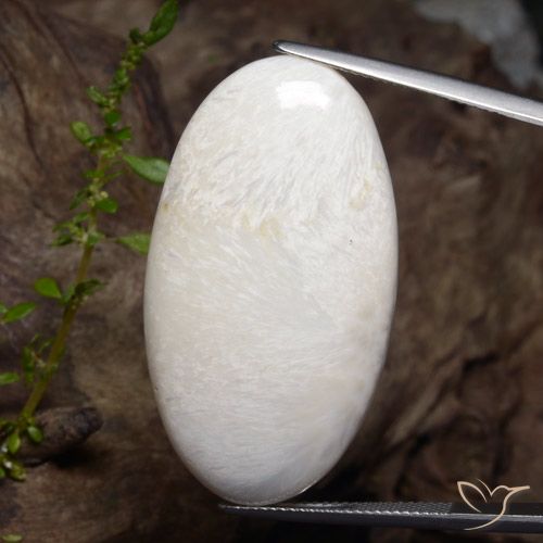 35.18 ct White Scolecite, 39.2 x 21.4 mm Oval Cut From South Africa, Photo A
