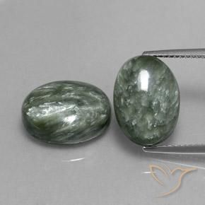 Paire Seraphinite Ovale 13,8 x 10mm assorties - Poids total 12,5 ct / moyenne 6,25 ct chacune, couleur Vert moyen et pureté Opaque , pierre gemme naturelle Non traité, dureté de Mohs 2 à 4, Photo A