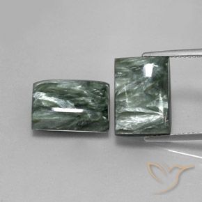Paire Seraphinite Baquette 13,9 x 9,9mm - Poids total 15,92 ct / moyenne 7,96 ct chaque, pierre gemme naturelle Non traité, couleur Vert moyen avec pureté Opaque , dureté Mohs 2 à 4, Photo A