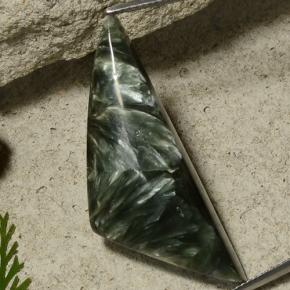 27.9ct Shark Fin Cabochon Green Seraphinite for sale thumb image of 27.9ct Shark Fin Cabochon Green Seraphinite (ID: 486313)