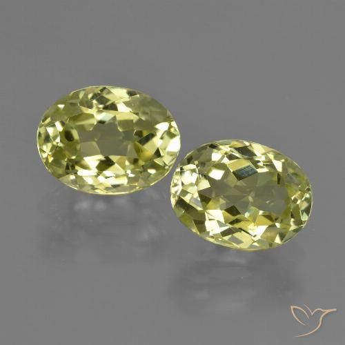 Silimanita Ovalada a juego de 2 piezas en tamaño 9 x 6,7mm, peso 4,26 ct en total / promedio. 2,13 ct cada uno, Amarillo verdoso en claridad vvs-vs, piedra preciosa natural No tratado, dureza de Mohs 6.5 - 7.5 Adecuado para joyas de uso diario, Photo A