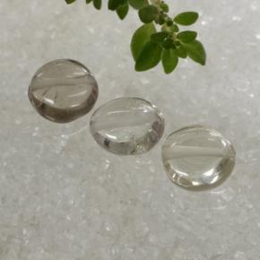 0.8ct Oval Cabochon with Hole Light Smoky Smoky Quartz Gem for sale 0.8ct Oval Cabochon with Hole Light Smoky Smoky Quartz Gem (ID: 479193)