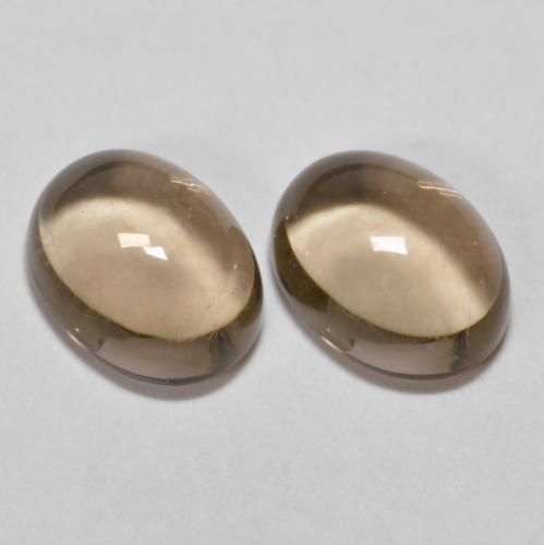 2 Stück/Paar Oval Rauchquarz in Größe 8 x 6,1mm, Gewicht 2,88 ct gesamt / durchschnittl. 1,44 ct, Mittel braun in Transparent Reinheit, Garantiert natürliche Edelsteine, Mohs-Härte 7 Geeignet für den täglichen Gebrauch im Schmuck, Photo A