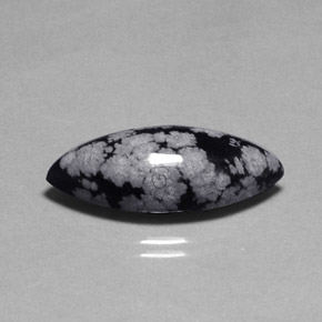 10.16 ct Multicolor Snowflake Obsidian Gemstone, Snowflake Obsidian Gem in Marquise Cabochon Shape for Sale.