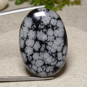 30.6ct Oval Cabochon Snowflake Snowflake Obsidian for sale thumb image of 30.6ct Oval Cabochon Snowflake Snowflake Obsidian (ID: 485622)