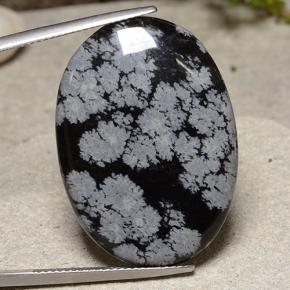 23.19 ct Multicolor Snowflake Obsidian Gemstone, Snowflake Obsidian Gem in Oval Cabochon Shape for Sale.