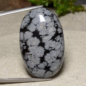 39.18 ct Multicolor Snowflake Obsidian Gemstone, Snowflake Obsidian Gem in Oval Cabochon Shape for Sale.