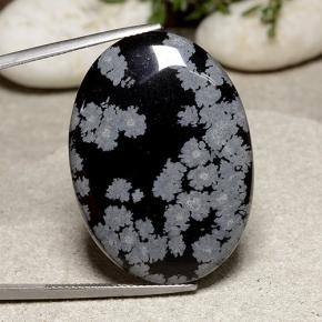 33.64 ct Multicolor Snowflake Obsidian Gemstone, Snowflake Obsidian Gem in Oval Cabochon Shape for Sale.