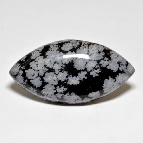 34.59 ct Multicolor Snowflake Obsidian Gemstone, Snowflake Obsidian Gem in Marquise Cabochon Shape for Sale.