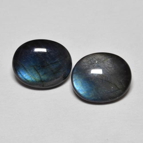 Coppia spettrolite taglio ovale da 10 x 8,2mm abbinati - Peso 4,45 ct totali / media. 2,23 ct ciascuno, colore Multicolore in purezza Opaque, pietra preziosa naturale non trattati, durezza Mohs 6 - 6,5, Photo A