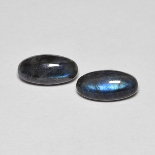 Coppia spettrolite Ovale abbinata 8,2 x 4,1mm - Peso 1,39 ct totali / media. 0,7 ct ciascuno, pietra preziosa naturale non trattati, colore Multicolore in purezza Opaque, durezza Mohs 6 - 6,5, Photo A