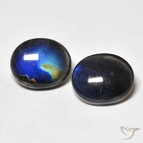 2 pezzi Spettrolite taglio ovale abbinati di dimensioni 10 x 8,2mm, peso 4,5 ct totali / media. 2,25 ct ciascuno, Multicolore in purezza Opaque, pietra preziosa naturale non trattati, durezza Mohs 6 - 6,5, Photo A