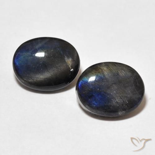 Coppia Spettrolite taglio ovale da 10,2 x 8,1mm abbinati - Peso 4,38 ct totali / media. 2,19 ct ciascuno, colore Multicolore in purezza Opaque, pietra preziosa naturale non trattati, durezza Mohs 6 - 6,5, Photo A
