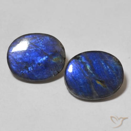 2 pezzi Spettrolite taglio ovale abbinati di dimensioni 10,1 x 8,3mm, peso 3,76 ct totali / media. 1,88 ct ciascuno, Multicolore in purezza Opaque, pietra preziosa naturale non trattati, durezza Mohs 6 - 6,5, Photo A