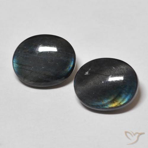 Coppia Spettrolite taglio ovale da 10,1 x 8,2mm abbinati - Peso 4,09 ct totali / media. 2,05 ct ciascuno, colore Multicolore in purezza Opaque, pietra preziosa naturale non trattati, durezza Mohs 6 - 6,5, Photo A