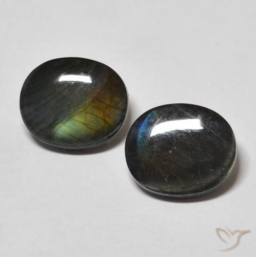 Coppia Spettrolite taglio ovale da 10 x 8,3mm abbinati - Peso 4,17 ct totali / media. 2,09 ct ciascuno, colore Multicolore in purezza Opaque, pietra preziosa naturale non trattati, durezza Mohs 6 - 6,5, Photo A