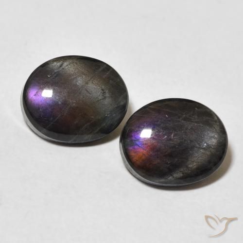 Coppia Spettrolite Ovale abbinata 10,1 x 8,3mm - Peso 4,55 ct totali / media. 2,28 ct ciascuno, pietra preziosa naturale non trattati, colore Multicolore in purezza Opaque, durezza Mohs 6 - 6,5, Photo A