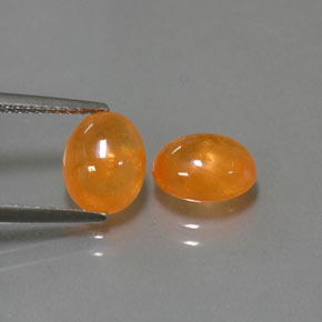 5.27 ct Orange Spessartite Garnet Gemstone, Spessartite Garnet Gem in Oval Cabochon Shape for Sale.