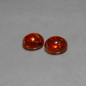 5.07 ct Red Spessartite Garnet Gemstone, Spessartite Garnet Gem in Oval Cabochon Shape for Sale.