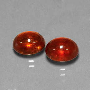 5.69 ct Orange Spessartite Garnet Gemstone, Spessartite Garnet Gem in Oval Cabochon Shape for Sale.