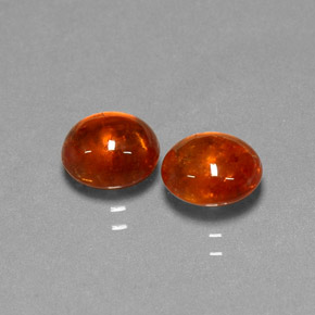 3.96 ct Orange Spessartite Garnet Gemstone, Spessartite Garnet Gem in Oval Cabochon Shape for Sale.