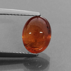 4.73 ct Orange Spessartite Garnet Gemstone, Spessartite Garnet Gem in Oval Cabochon Shape for Sale.
