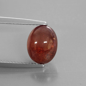 5.47 ct Orange Spessartite Garnet Gemstone, Spessartite Garnet Gem in Oval Cabochon Shape for Sale.