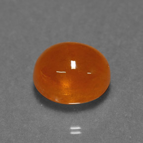 6.24 ct Orange Spessartite Garnet Gemstone, Spessartite Garnet Gem in Oval Cabochon Shape for Sale.