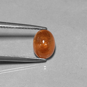 2.37 ct Orange Spessartite Garnet Gemstone, Spessartite Garnet Gem in Oval Cabochon Shape for Sale.